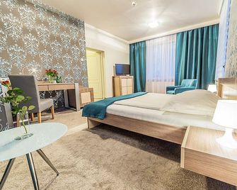 Hotel TM - Radom - Schlafzimmer
