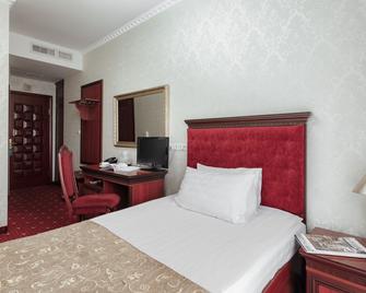 Boutique Hotel California - Odesa - Camera da letto