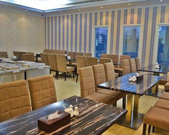Better Living Hotel Apartment - Dubái - Restaurante