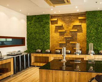 瑪迪胡施里飯店 - 哥打 - 餐廳