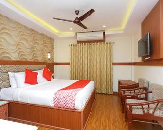 Capital O Kovilakam Residency - Thrissur - Habitación