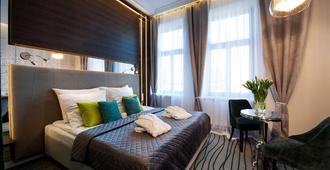 Plaza Boutique Hotel - Krakow - Phòng ngủ