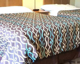 Deluxe Inn - Toronto - Bedroom