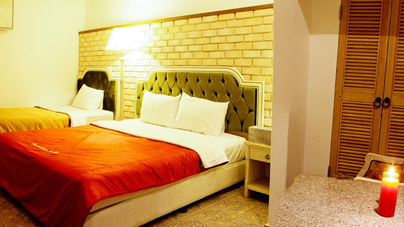 أسان بارادايس هوتل