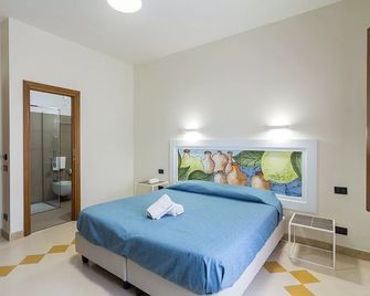 Hotel Tannure - סן ויטו לו קאפו - חדר שינה