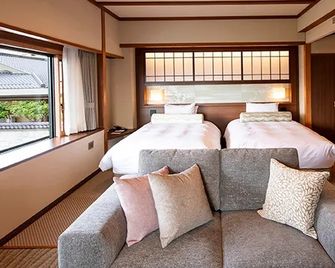 Hotel Saginoyu - Suwa - Soveværelse