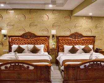 Hotel Amil - Rajapalaiyam - Bedroom