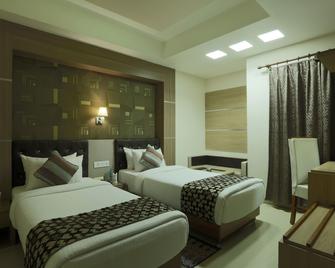 Hotel SJ International - Guwahati - Habitación