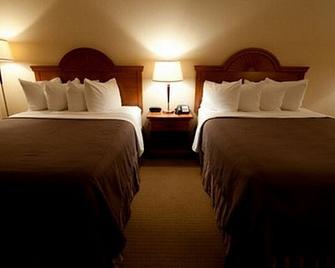 Red Coach Inn & Suites - Red Oak - Bedroom
