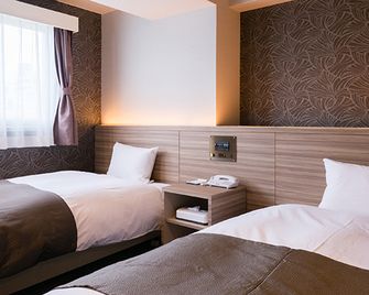 R Hotel Re.Osaka Nagai Park - אוסקה - חדר שינה