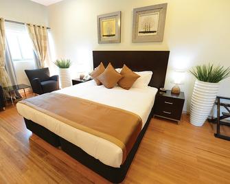 Timor Plaza Hotel & Apartments - Dili - Chambre
