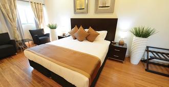 Timor Plaza Hotel & Apartments - Dili - Bedroom