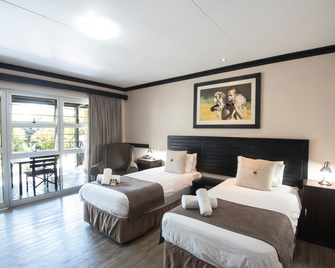 Arebbusch Travel Lodge - Windhoek - Yatak Odası