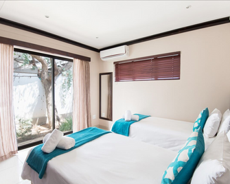 Arebbusch Travel Lodge - Windhoek - Camera da letto