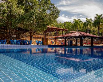 Pousada do Ipê - كالداس نوفاس - حوض السباحة