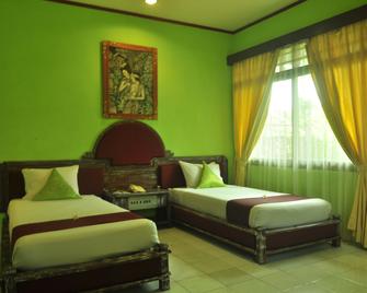 Kutus Kutus Sunari Beach Resort - Buleleng - Bedroom