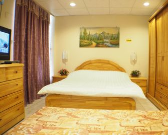Sunmoonstar Hostel - Budai Township - Bedroom