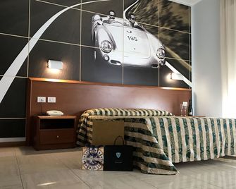 Hotel Industria - Брешія - Спальня