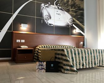 Hotel Industria - ברשיה - חדר שינה