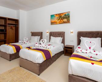 Canary Nungwi Hotel - Nungwi - Schlafzimmer