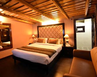 H K Legacy - نينيتال - غرفة نوم