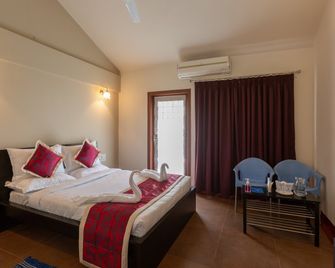 Kstdc Hotel Mayura Yagachi, Belur - Chikmagalur - Camera da letto