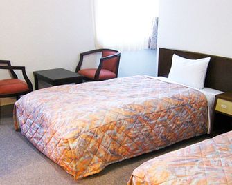 Garden Hotel Matsumoto - Matsumoto - Schlafzimmer