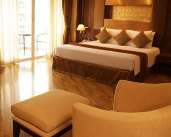 Nova Gold Hotel - Pattaya - Schlafzimmer