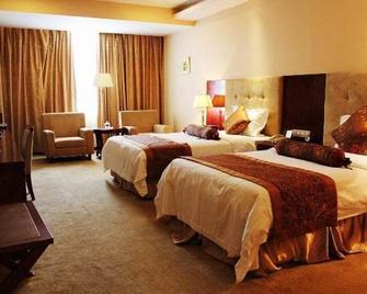 Zibo Wellhoo Hotel - Zibo - Habitación