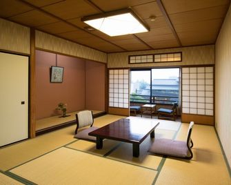 Awara Onsen Minoya Taiheikaku - Awara - Dining room
