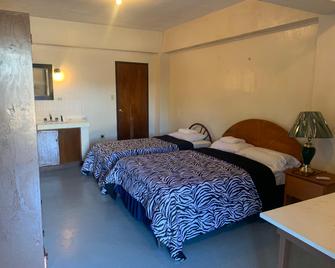 إيفونيز هوتل - Pohnpei - غرفة نوم