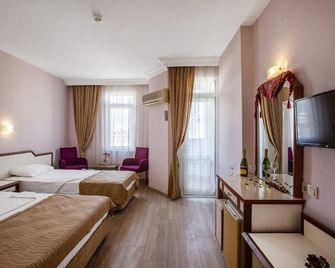 Ergün Hotel - אלניה - חדר שינה