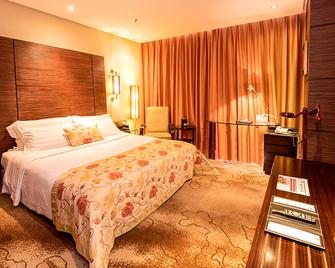 Luoyang International Hotel - Luoyang - Kamar Tidur