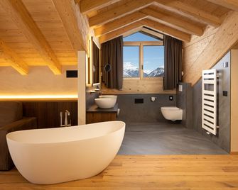 Camino Rustic Chic Hotel - ליביניו - חדר רחצה