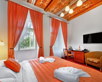 Hotel Lippert - Praag - Slaapkamer