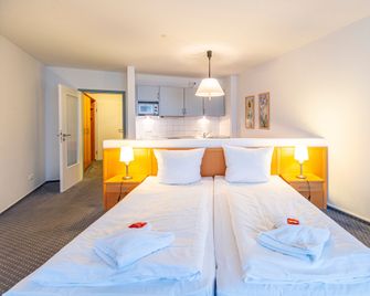Hotel Rostock West Im Kritzmow Park - Kritzmow - Bedroom