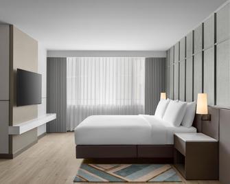 Courtyard by Marriott Bangkok Sukhumvit 20 - Μπανγκόκ - Κρεβατοκάμαρα