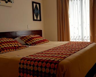 Hotel Suites Lago Chico Inn - Bogotá - Bedroom
