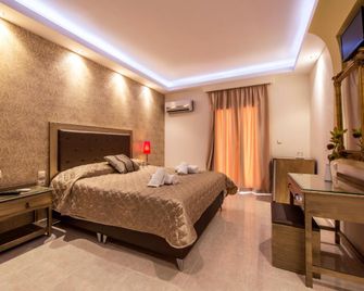 بيروفاني - Lefkáda - غرفة نوم