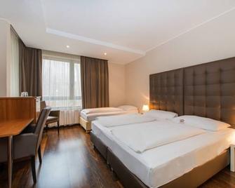 Pakat Suites Hotel - Wina - Kamar Tidur