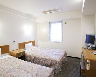 Hotel New Budget Sapporo - Sapporo - Quarto