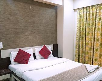 Nishita Residency - מומבאי - חדר שינה