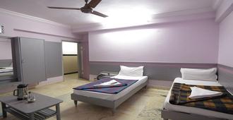 Hotel Pritam - Central Avenue Nagpur - Nagpur - Camera da letto