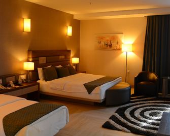 Titanic Hotel & Spa - Silemani - Schlafzimmer