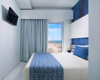 Molos Hotel - Potos - Schlafzimmer