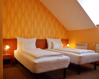 König Hotel - Pécs - Camera da letto