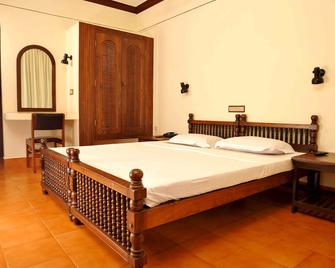 Vijaya Varma Beach Resort - Kovalam - Habitación