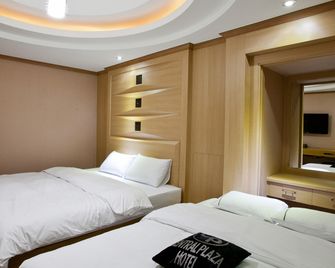 Central Plaza Hotel - Suwon - Ložnice