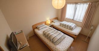 Guesthouse Mintaro Hut - Yamagata - Slaapkamer