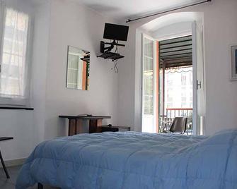 Delaide Rooms - Levanto - Schlafzimmer